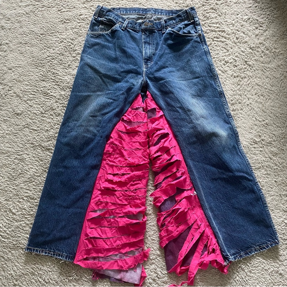 Ripped pink wide leg pants